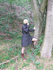 Blonde mature slut playing naked in the forest